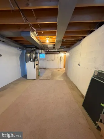 a front view of a house with a snow