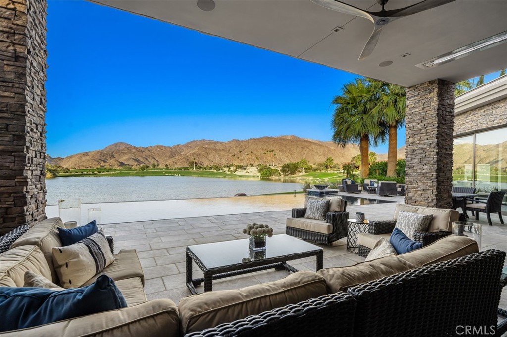 49967 Ridge View Way Palm Desert, CA 92260 - Photo 14 of 68 Heat lamps, ceiling fan and speakers under the huge covered veranda. Perfect for every season.