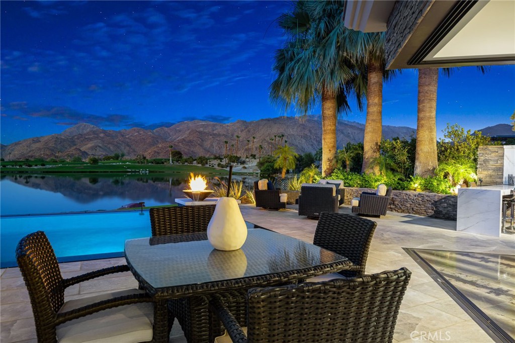 49967 Ridge View Way Palm Desert, CA 92260 - Photo 28 of 68 Outstanding views with disappearing corner walls of glass.