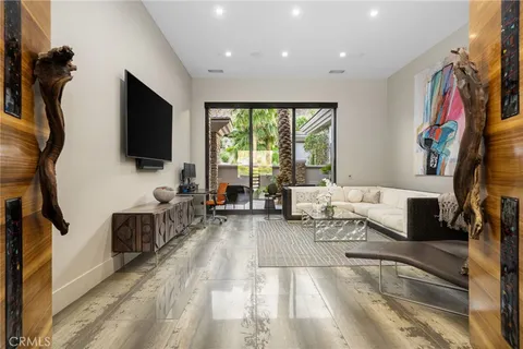 a kitchen with stainless steel appliances a sink dishwasher stove and refrigerator