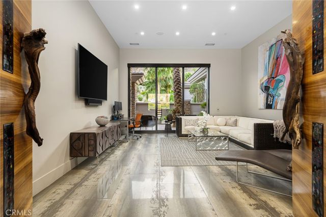 a kitchen with stainless steel appliances a sink dishwasher stove and refrigerator