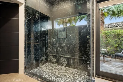 a en suite bathroom with a sink and a mirror