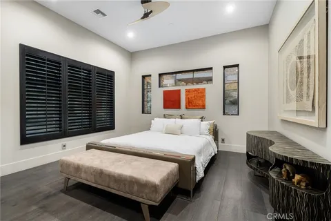 a view of house with swimming pool and mountains in the background