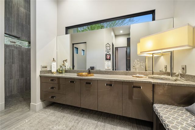 a view of a city with mountains in the background