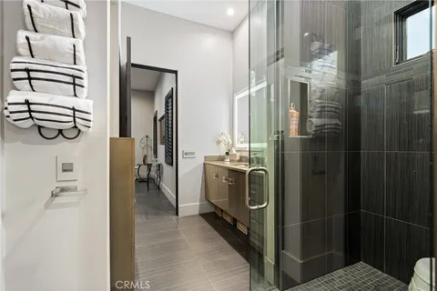 a view of swimming pool with outdoor seating and mountain view