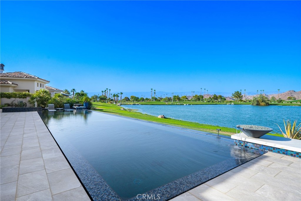 49967 Ridge View Way Palm Desert, CA 92260 - Photo 58 of 68 a view of swimming pool with outdoor space and seating