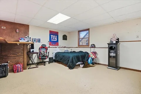 a bed room with a bed and a desk