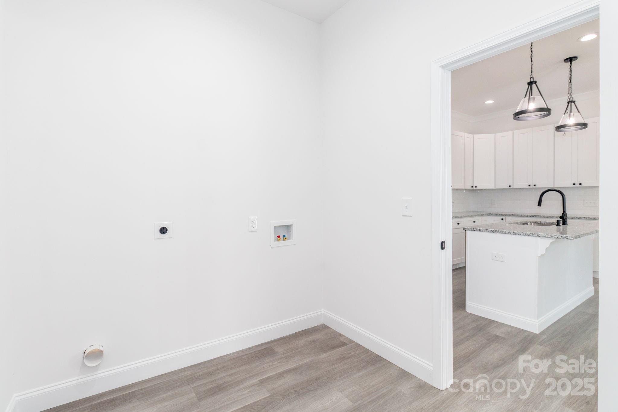 307 East Arch Street Lancaster, SC 29720 - Photo 21 of 43 a view of a kitchen from the sink