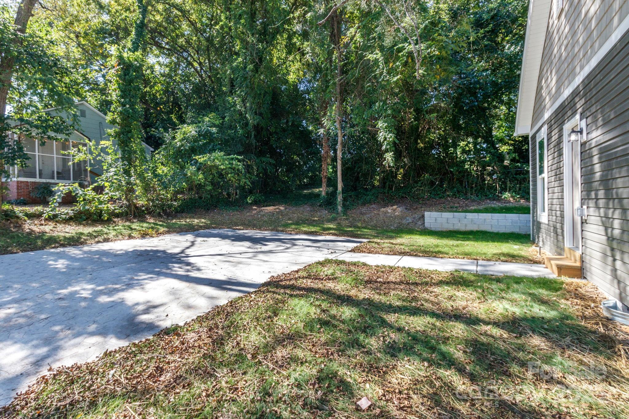 307 East Arch Street Lancaster, SC 29720 - Photo 41 of 43 a view of a yard with a tree