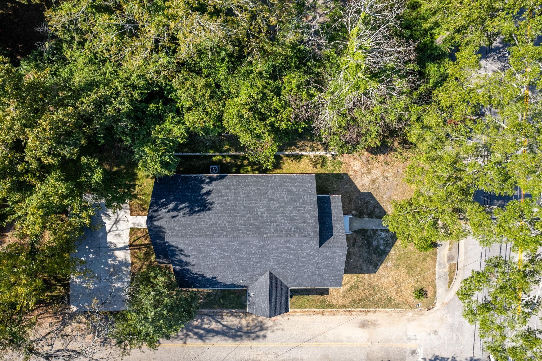 307 East Arch Street Lancaster, SC 29720 - Photo 42 of 43 an aerial view of a house with large trees