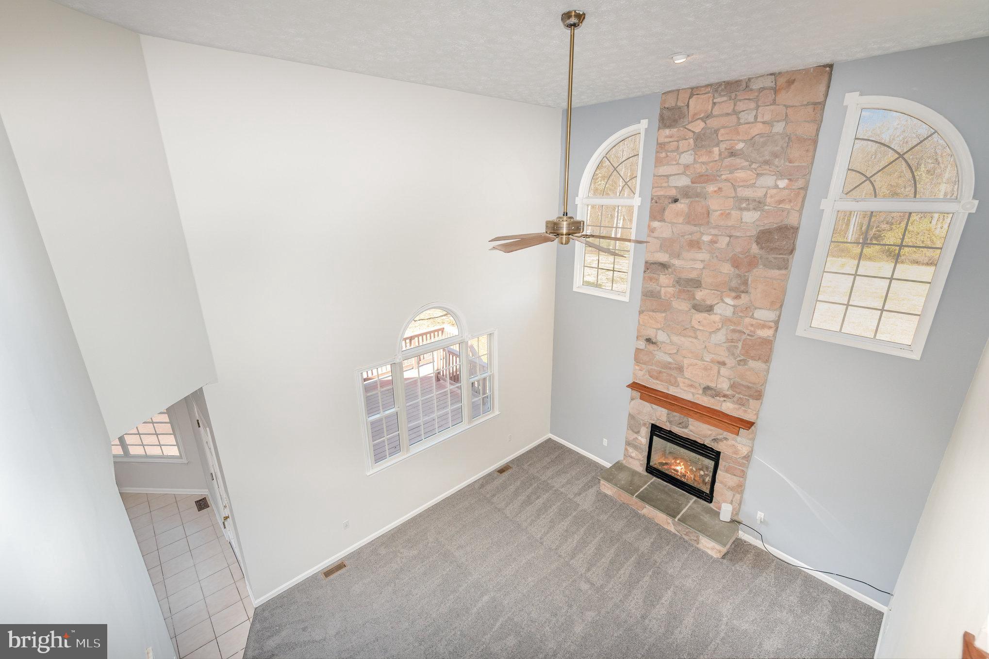 535 Oldfield Point Road Elkton, MD 21921 - Photo 5 of 46 a view of empty room with windows