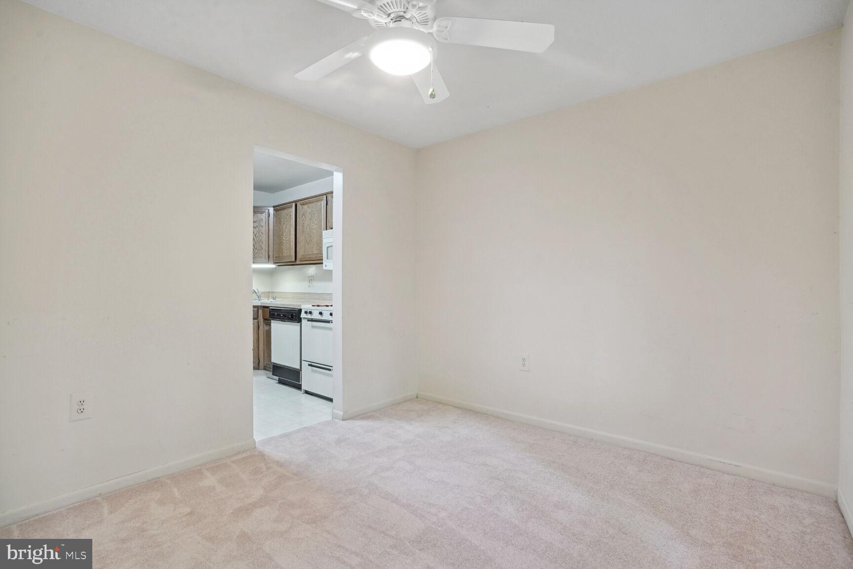 1546 Northgate Square, Unit 154622B Reston, VA 20190 - Photo 16 of 25 Dining area looking into kitchen