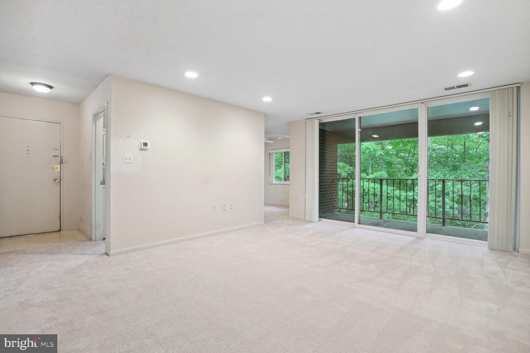 1546 Northgate Square, Unit 154622B Reston, VA 20190 - Photo 5 of 25 Updated Sliding Glass Doors, private balcony
