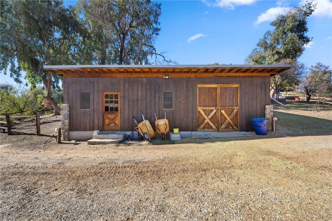 17705 Rodeo Road Lake Elsinore, CA 92530 - Photo 48 of 65 Shed with Hay Storage and Garden Storage