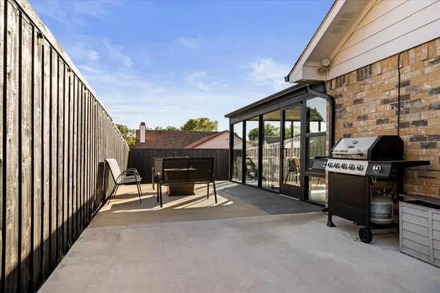 a view of balcony with furniture