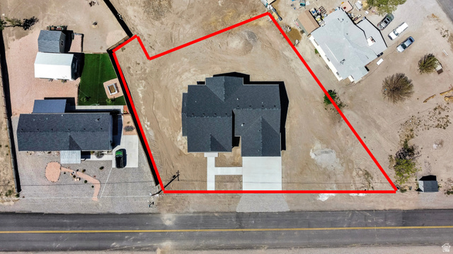 840 South Jones Road Monroe, UT 84754 - Photo 44 of 52 Lines are approximate. New construction featuring a dark shingle roof, concrete driveway, and an expansive lot