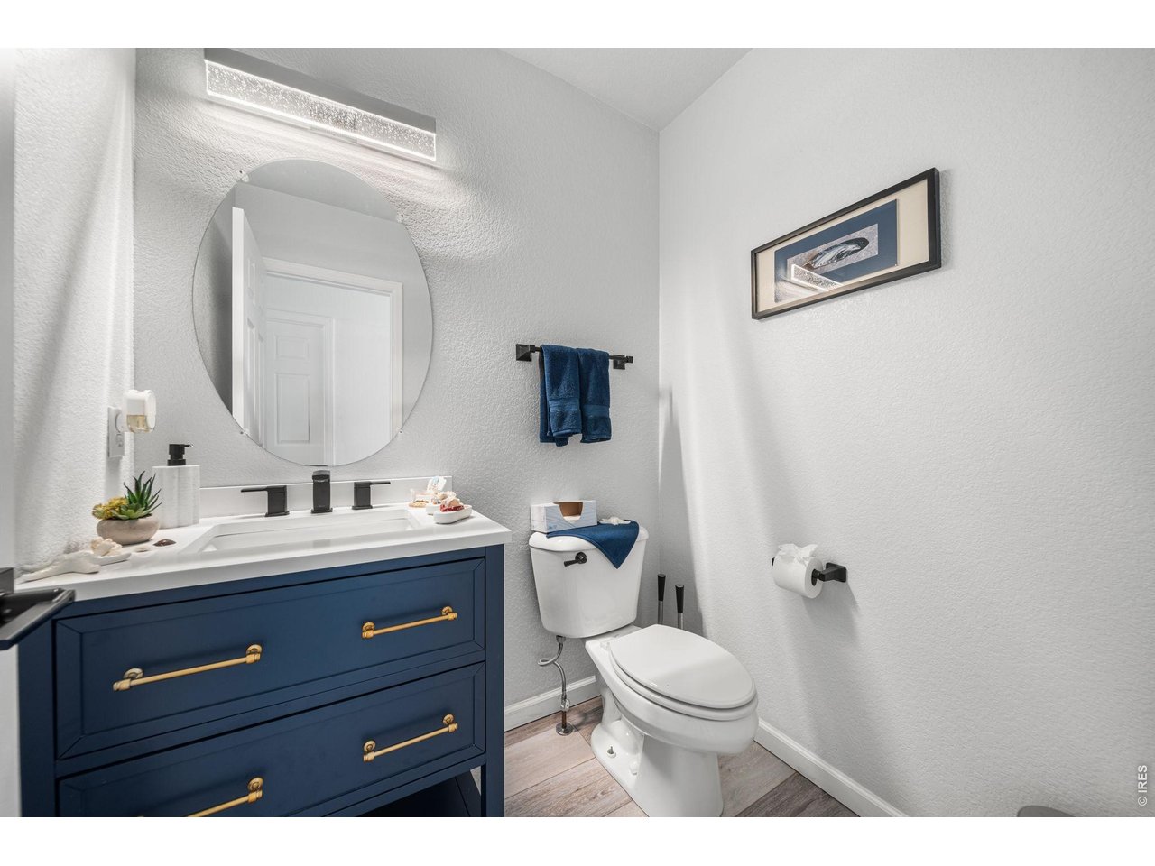 16645 Tree Haven Street Hudson, CO 80642 - Photo 14 of 38 Main Floor 1/2 Bathroom
