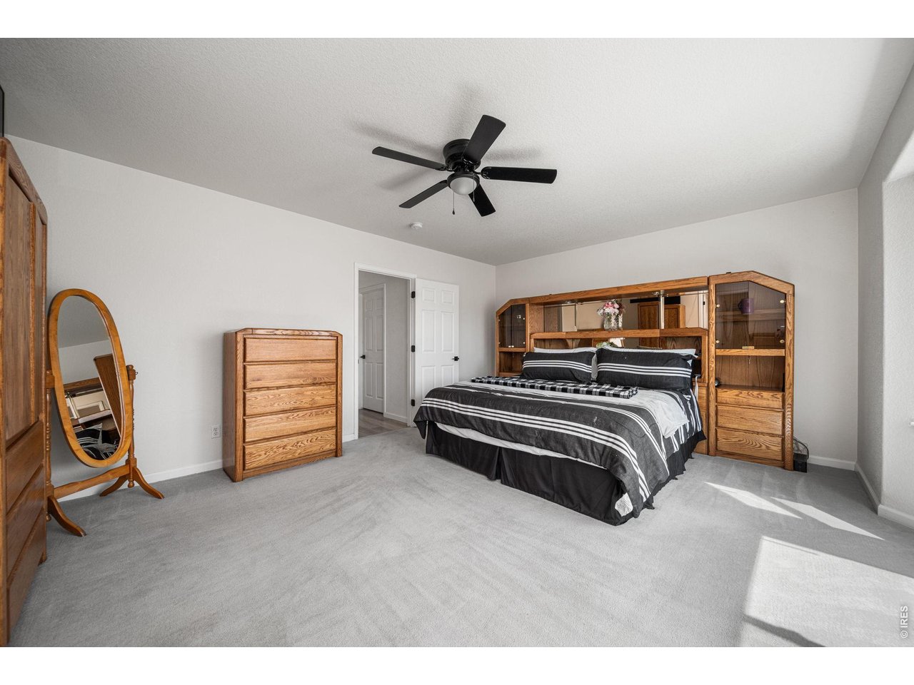 16645 Tree Haven Street Hudson, CO 80642 - Photo 17 of 38 Main Floor Primary Bedroom