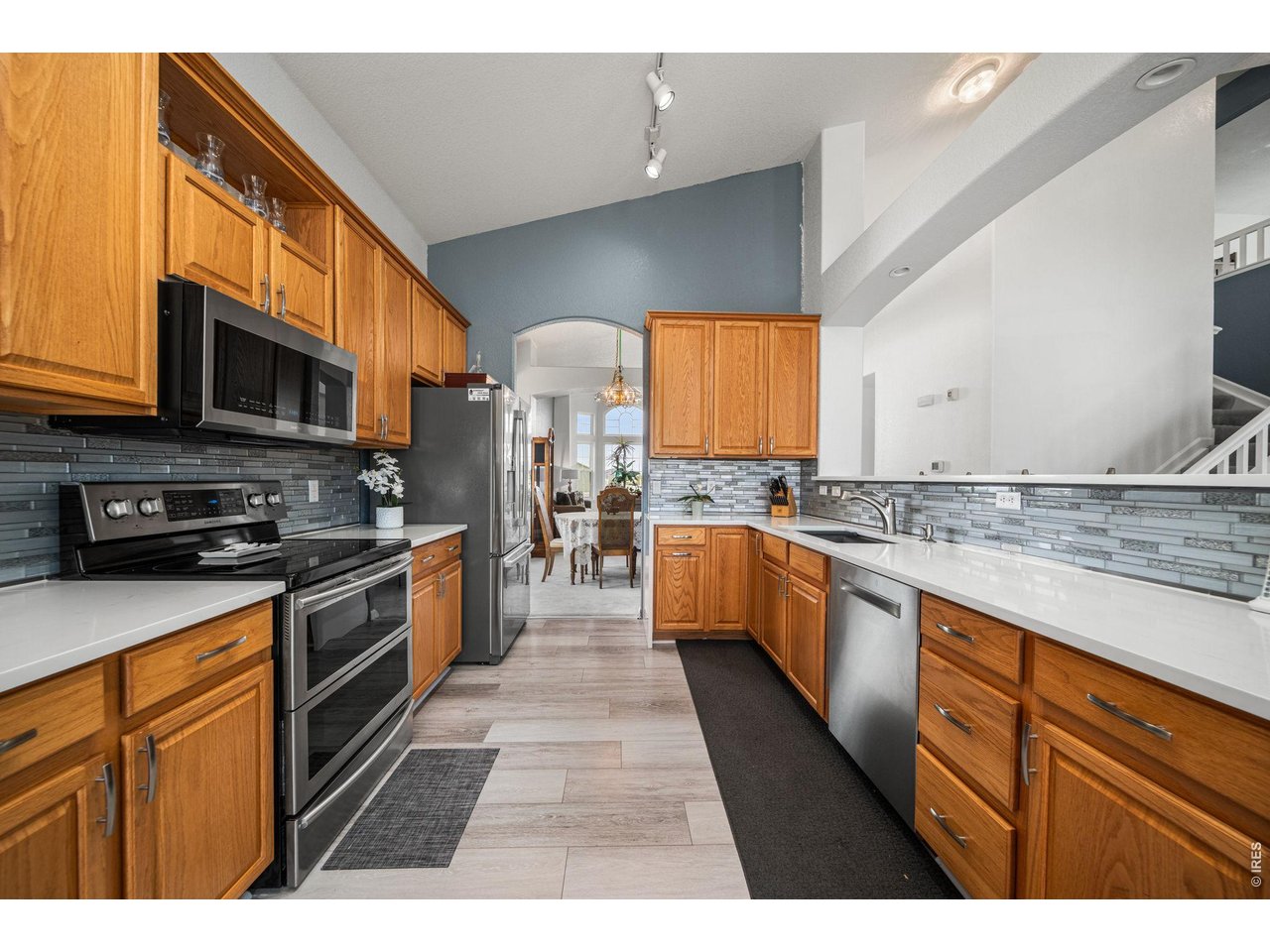 16645 Tree Haven Street Hudson, CO 80642 - Photo 8 of 38 Thoughtfully Updated Kitchen with Quartz Countertops