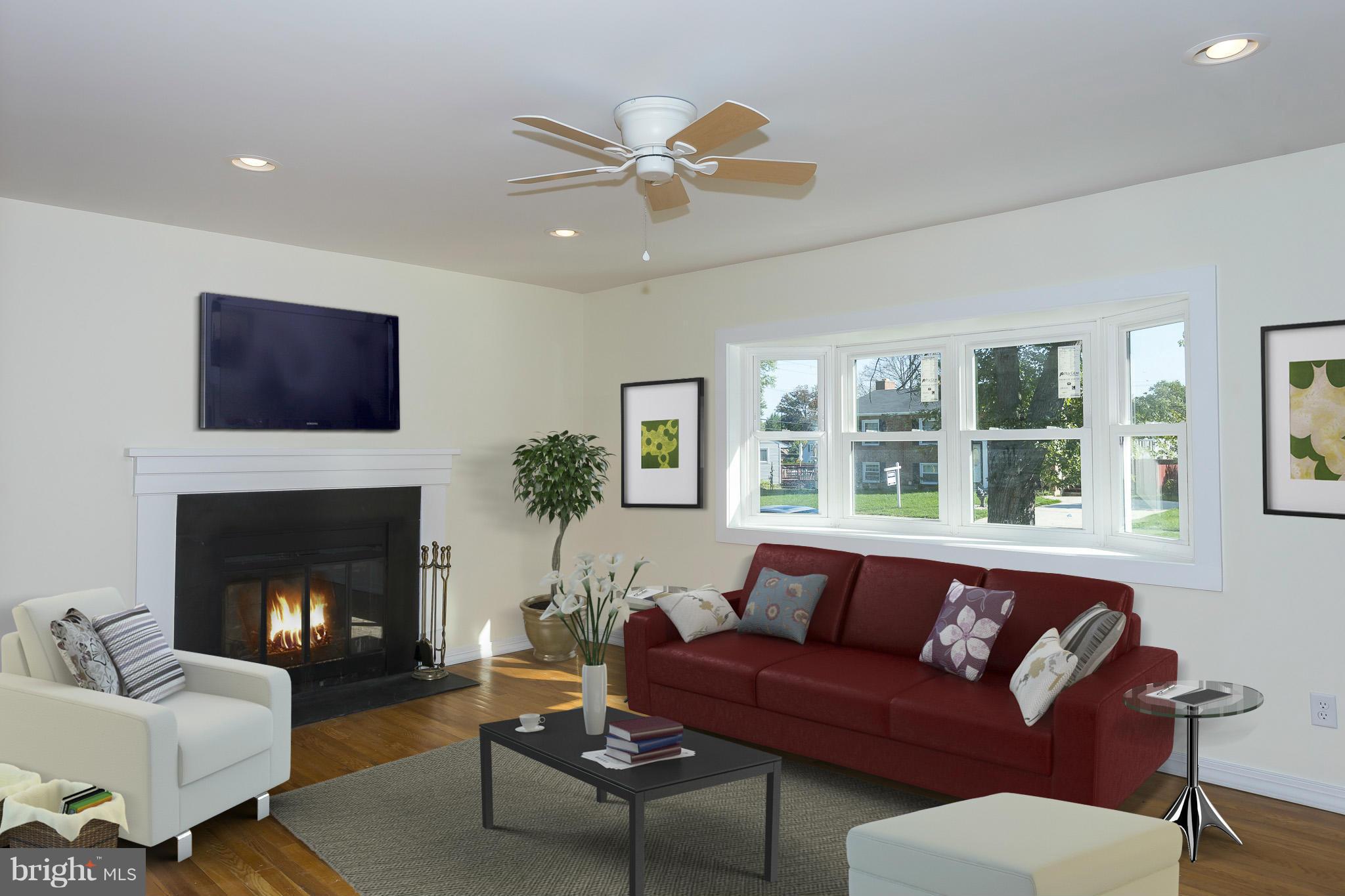 604 Shirley Manor Road Reisterstown, MD 21136 - Photo 4 of 27 Living Room w/ fireplace & new bay window
