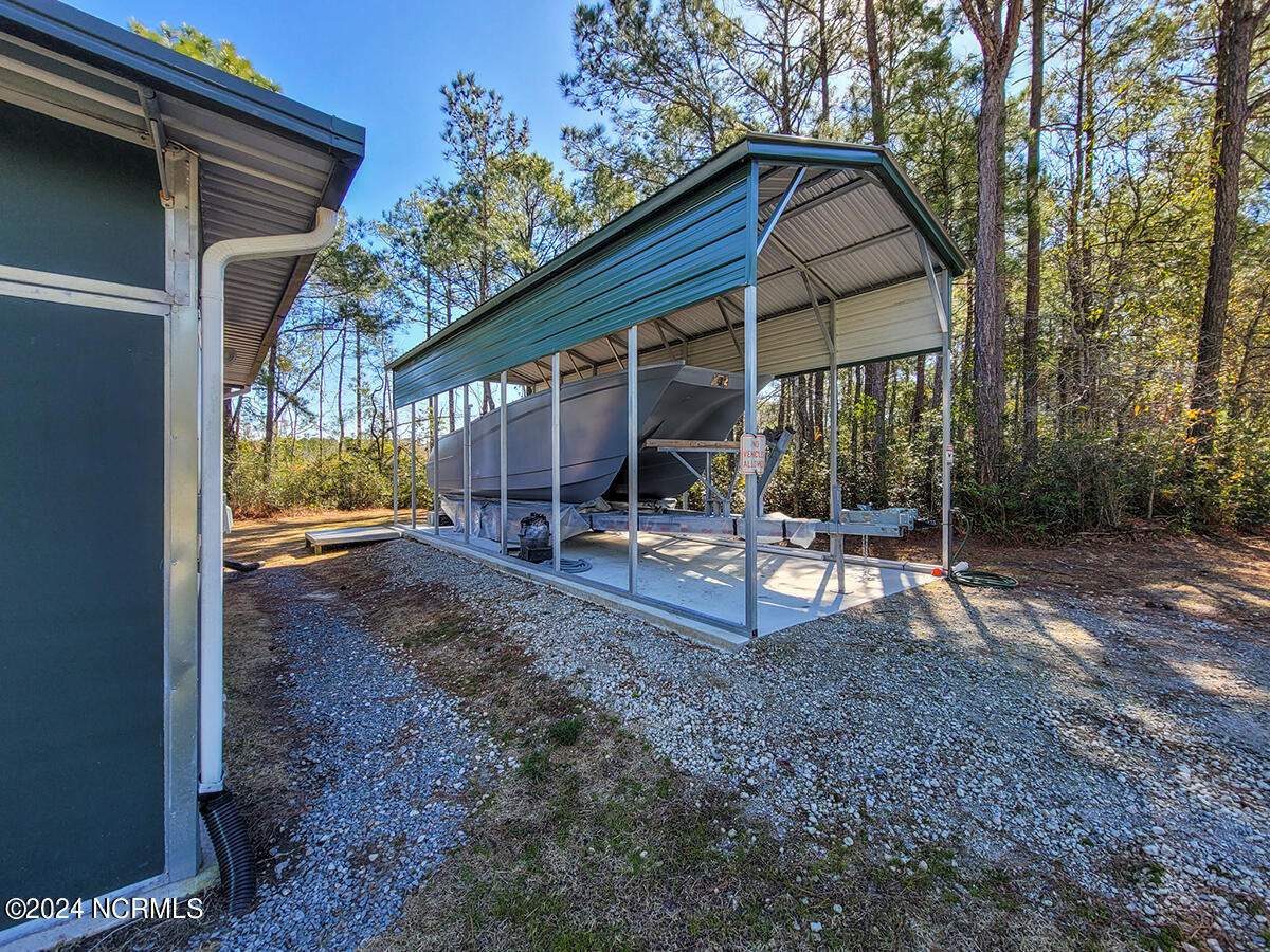 171 Stump Sound Church Road Holly Ridge, NC 28445 - Photo 61 of 111 RV storage/carport