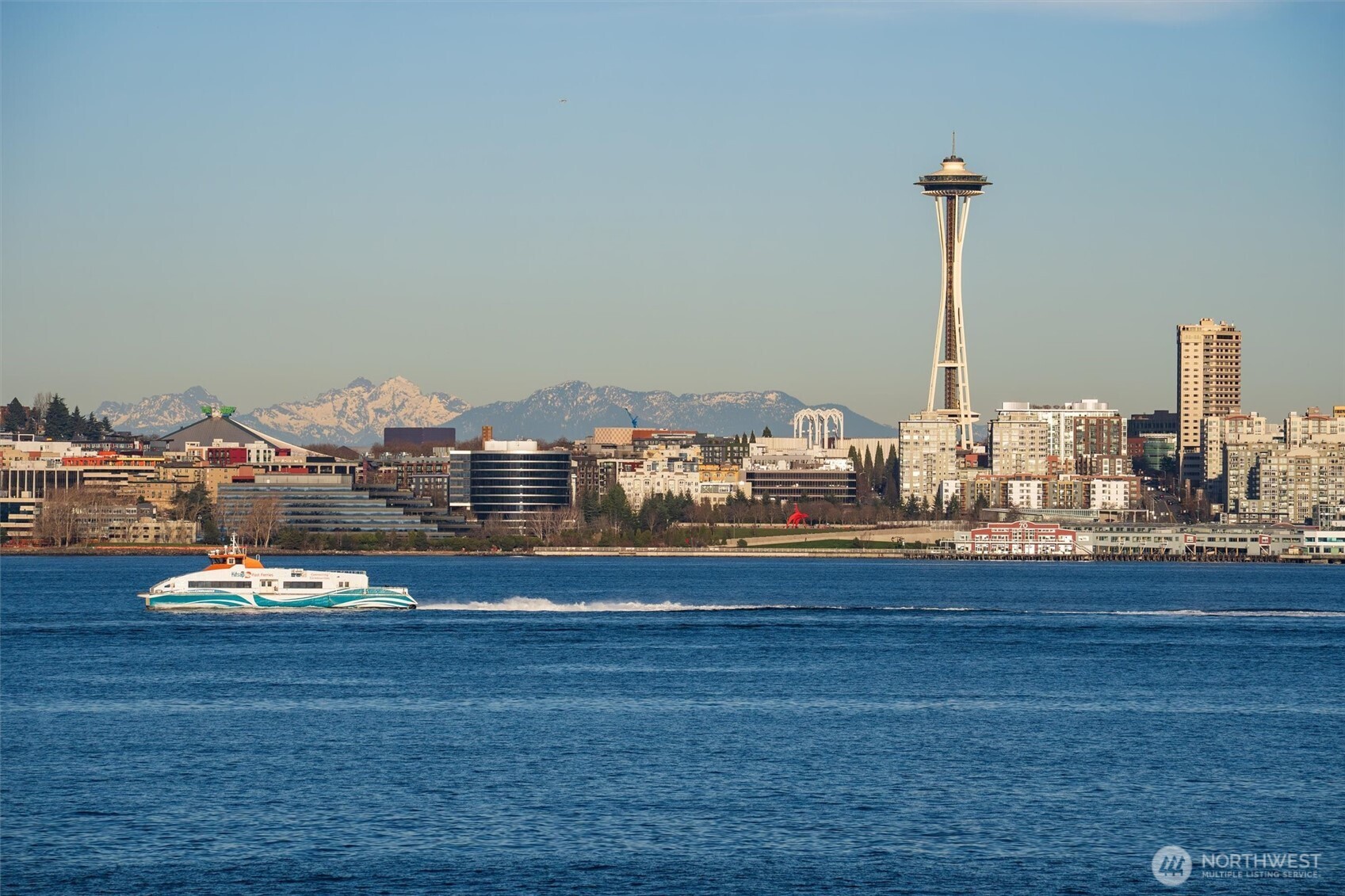 1005 Harbor Avenue Southwest, Unit 400 Seattle, WA 98116 - Photo 32 of 39 a view of a ocean with tall buildings
