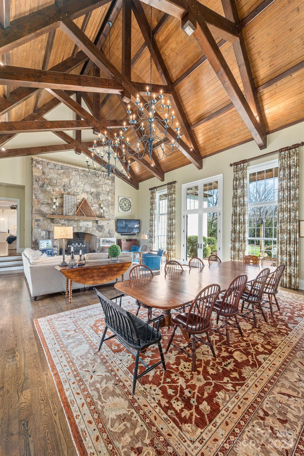 165 Timberside Drive Davidson, NC 28036 - Photo 11 of 48 a view of a dining room with furniture wooden floor and a chandelier