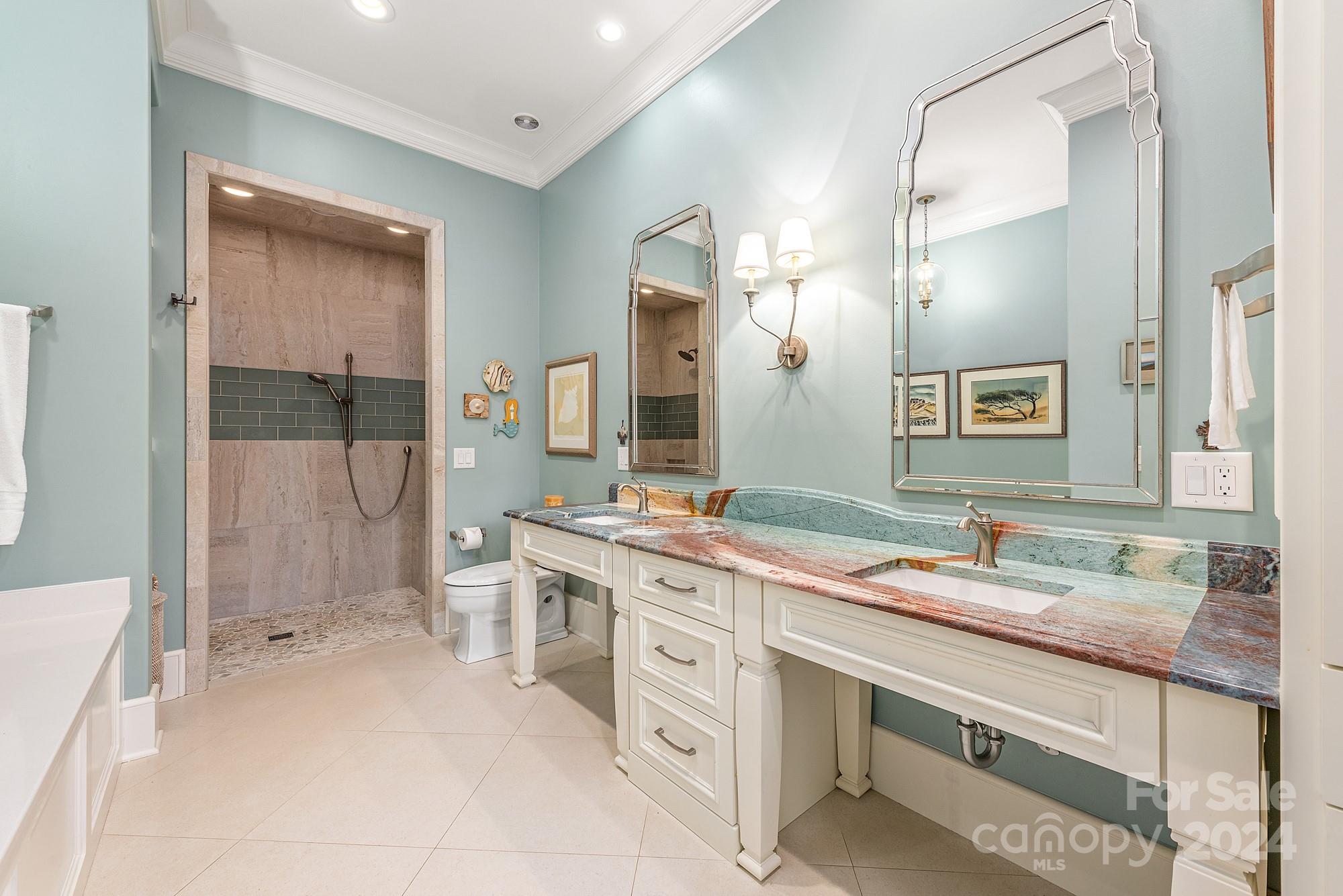 165 Timberside Drive Davidson, NC 28036 - Photo 18 of 48 a spacious bathroom with a granite countertop sink mirror and shower