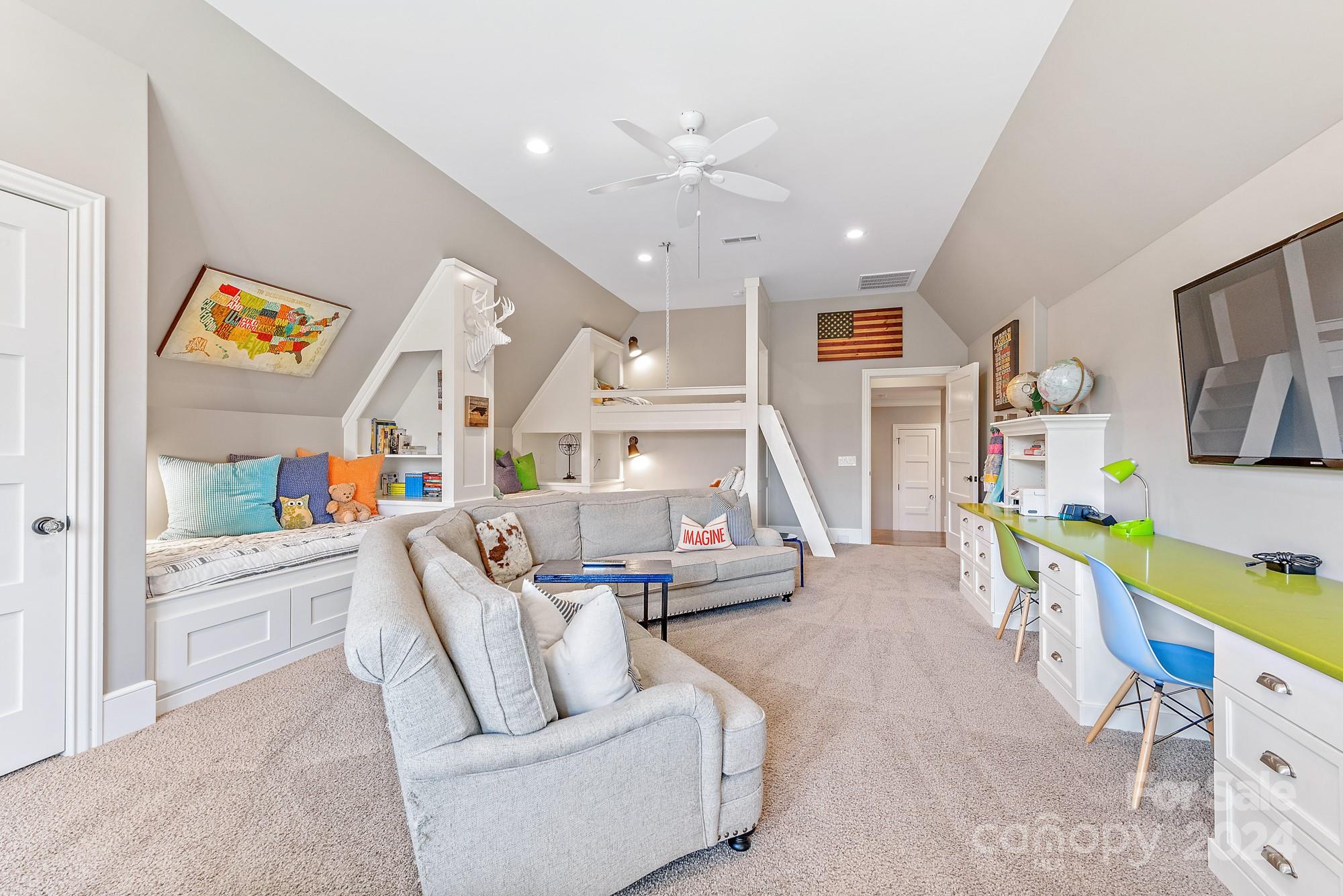 165 Timberside Drive Davidson, NC 28036 - Photo 21 of 48 a living room with furniture and a wooden floor