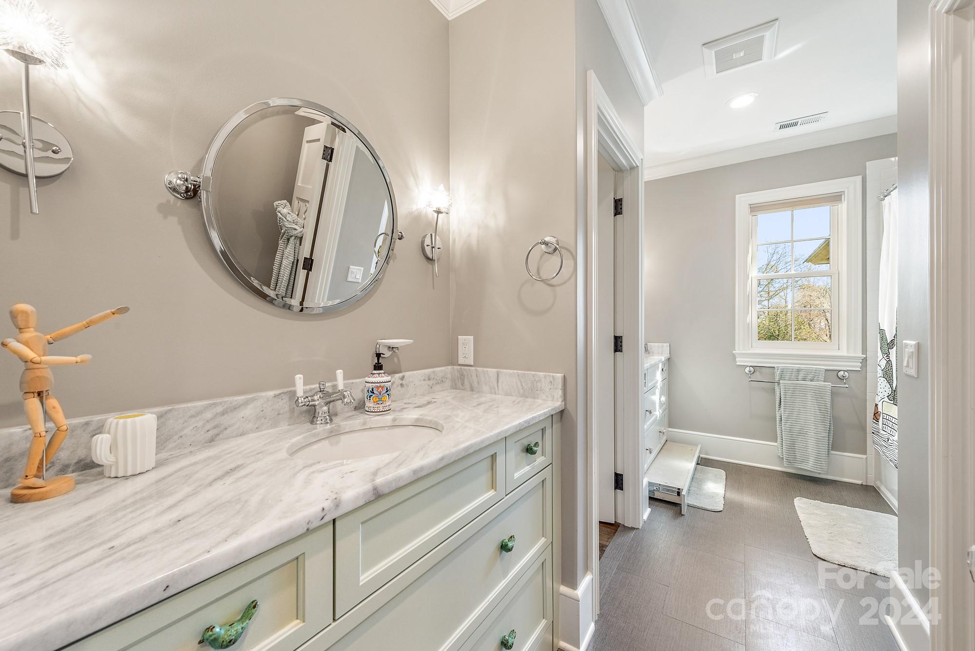 165 Timberside Drive Davidson, NC 28036 - Photo 23 of 48 a en suite bathroom with a granite countertop sink and a mirror
