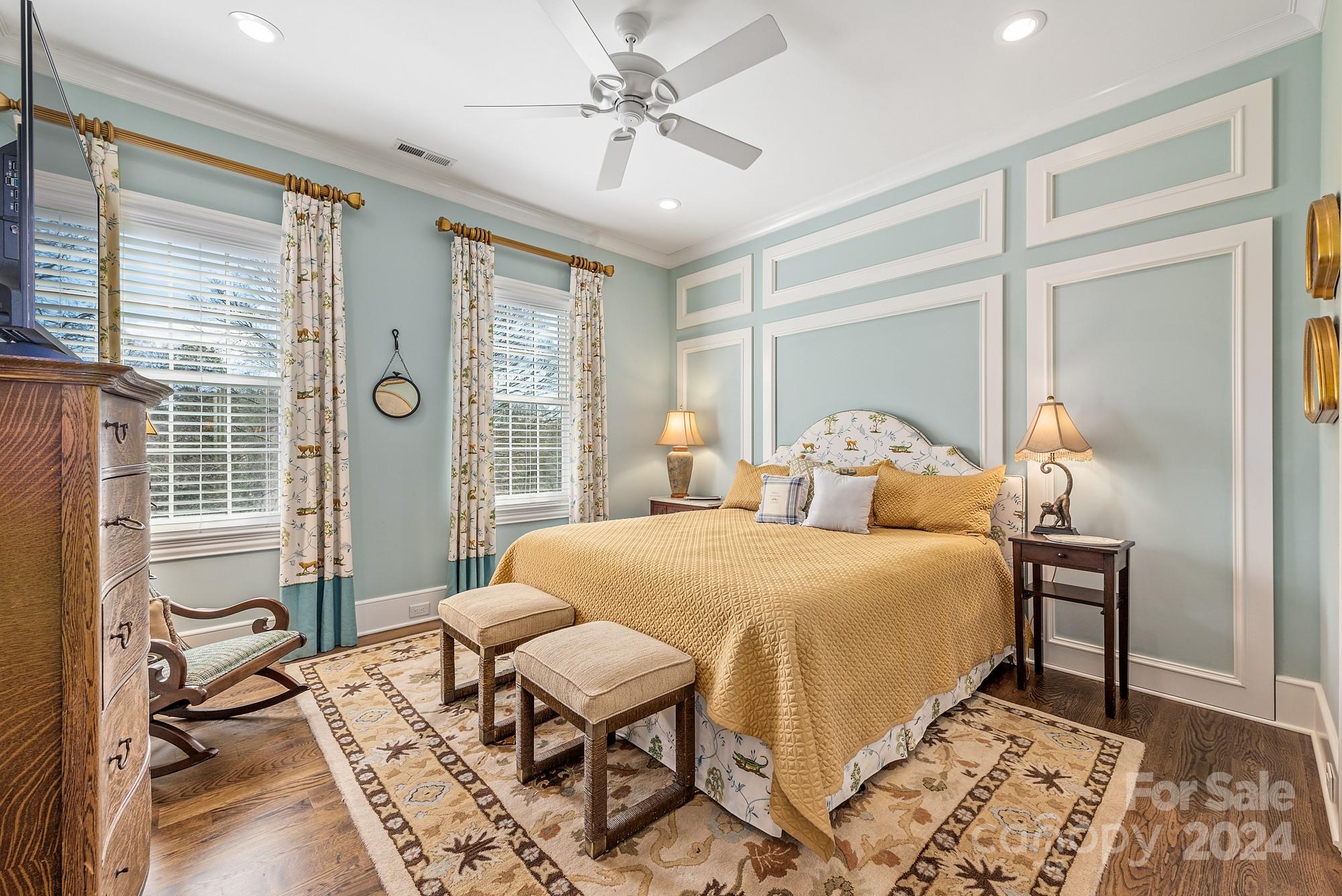 165 Timberside Drive Davidson, NC 28036 - Photo 27 of 48 a bedroom with a bed and wooden floor