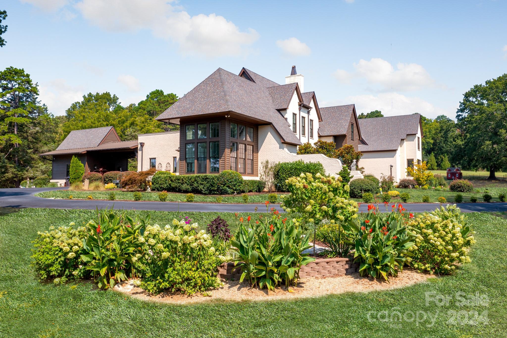 165 Timberside Drive Davidson, NC 28036 - Photo 31 of 48 a front view of a house with a yard