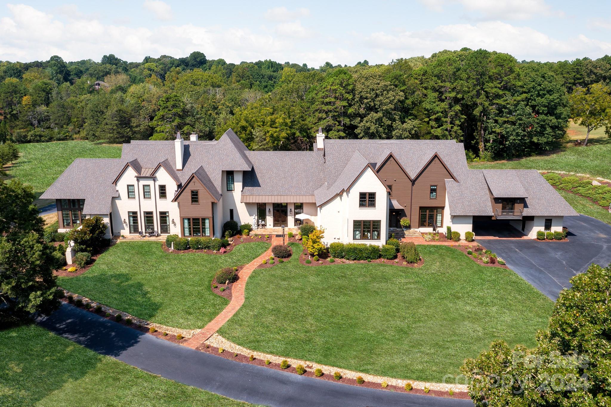 165 Timberside Drive Davidson, NC 28036 - Photo 32 of 48 a view of house with garden