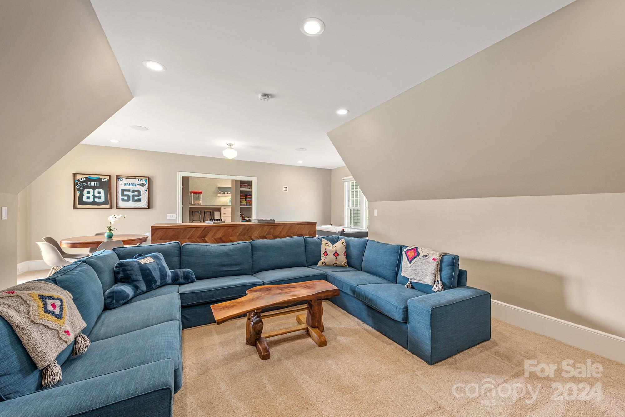 165 Timberside Drive Davidson, NC 28036 - Photo 36 of 48 a living room with furniture and a couch