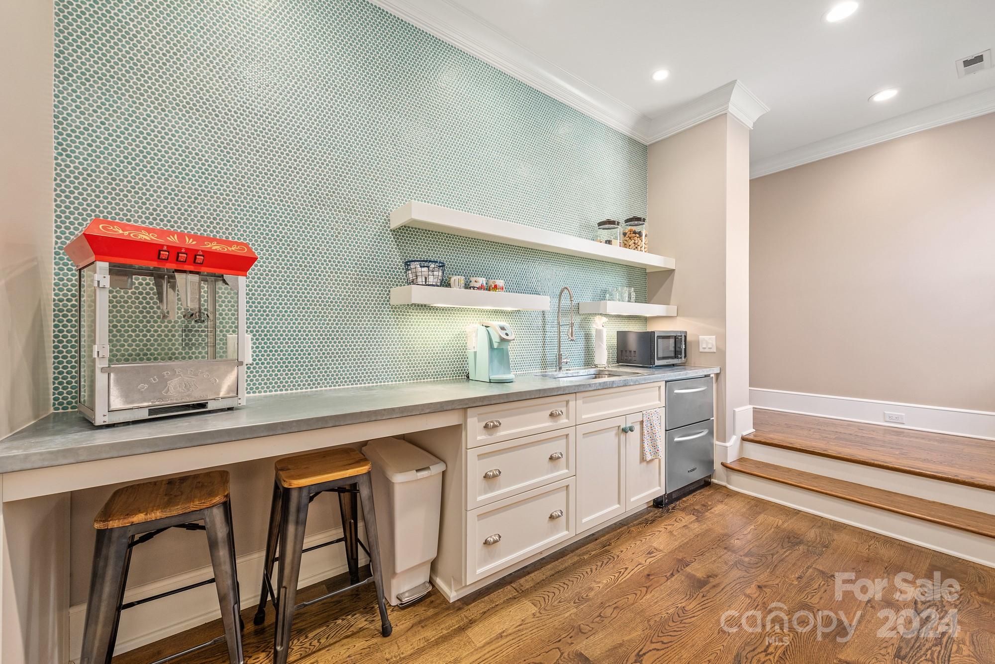 165 Timberside Drive Davidson, NC 28036 - Photo 37 of 48 a spacious bathroom with a granite countertop sink and a mirror
