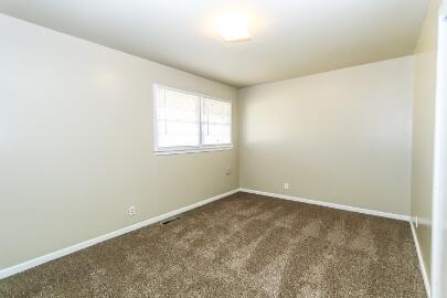 5408 31st Street Lubbock, TX 79407 - Photo 21 of 33 an empty room with a window