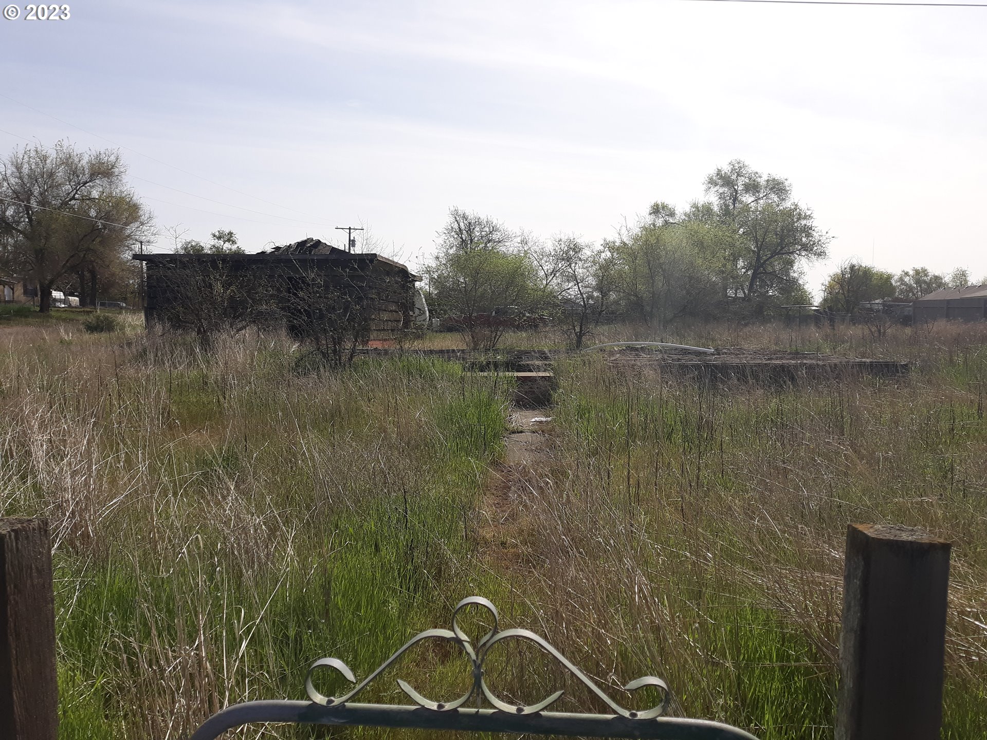 31040 Cecil Street Hermiston, OR 97838 - Photo 3 of 4 a view of a lake with a mountain in the background