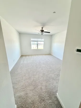 a spacious bathroom with a double vanity sink and a mirror