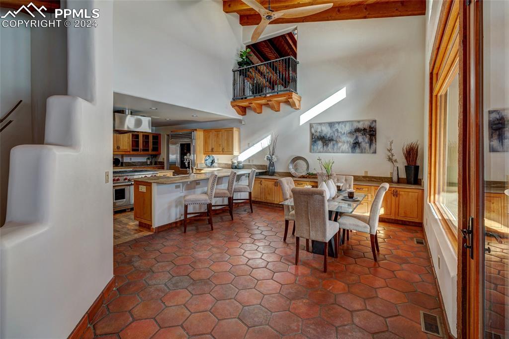 15 4th Street Colorado Springs, CO 80906 - Photo 15 of 46 a living room with furniture a fireplace and a flat screen tv
