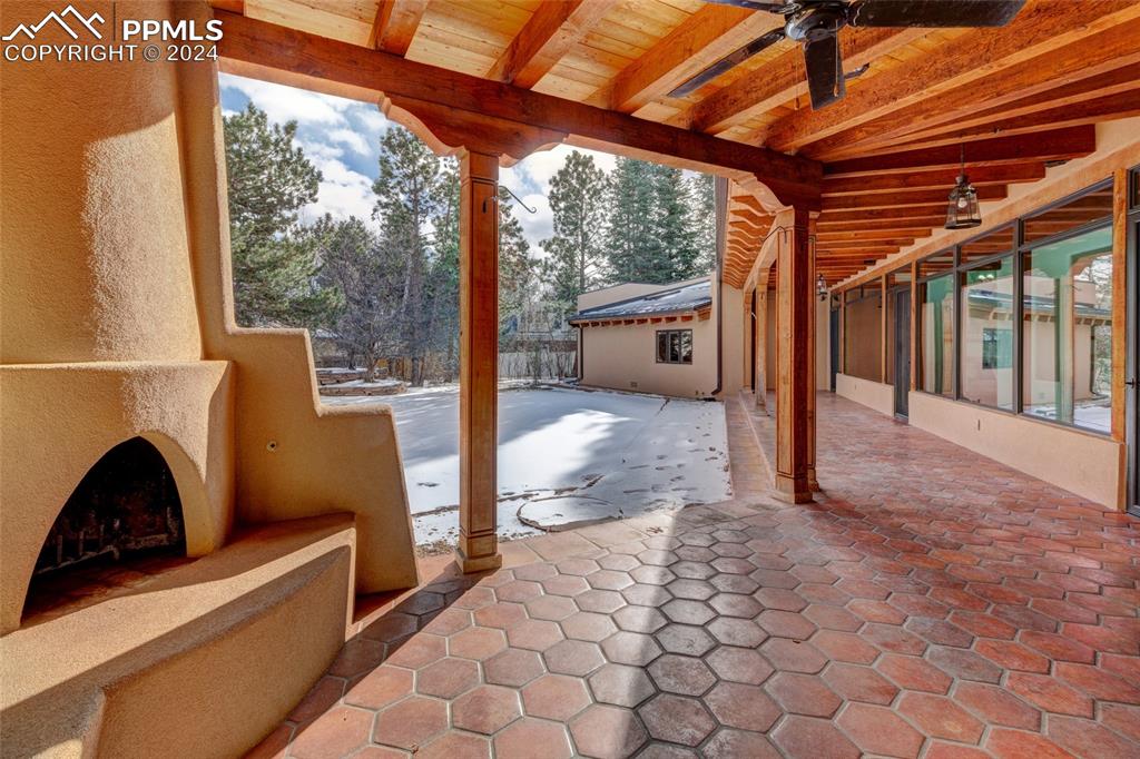 15 4th Street Colorado Springs, CO 80906 - Photo 2 of 46 a view of a porch with furniture and a backyard