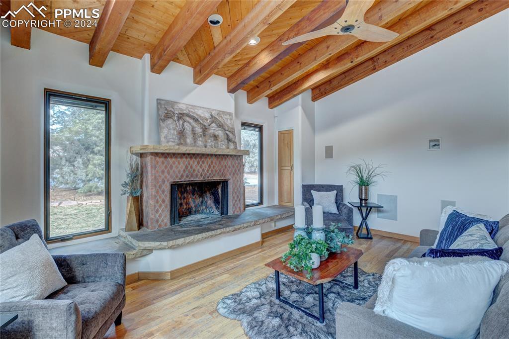 15 4th Street Colorado Springs, CO 80906 - Photo 22 of 46 a living room with furniture and a fireplace
