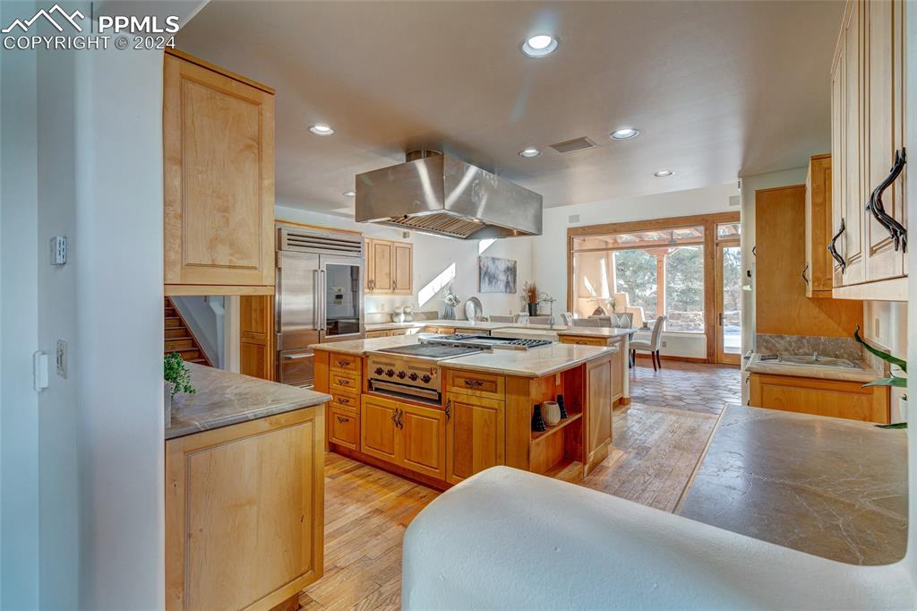 15 4th Street Colorado Springs, CO 80906 - Photo 23 of 46 a kitchen with stainless steel appliances granite countertop a stove and a sink