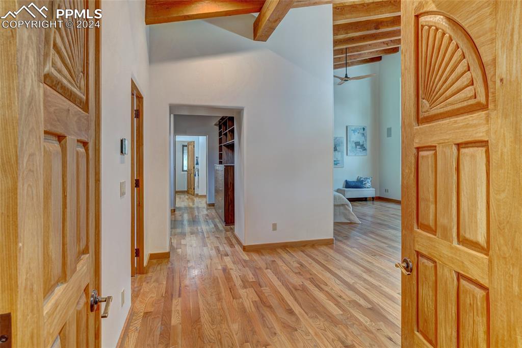 15 4th Street Colorado Springs, CO 80906 - Photo 27 of 46 a view of a hallway with wooden floor and staircase
