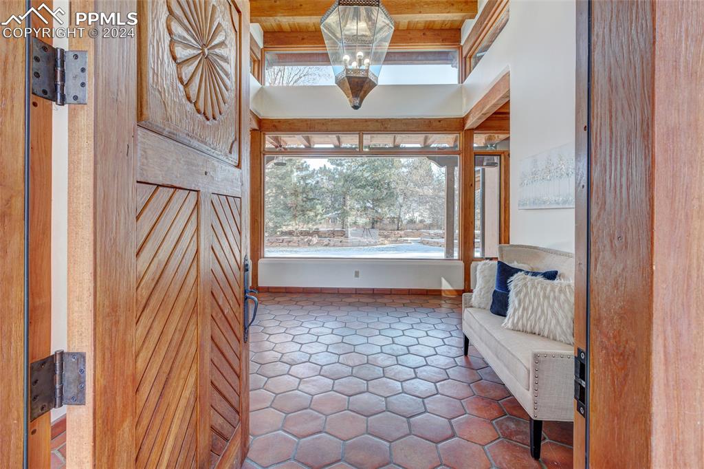 15 4th Street Colorado Springs, CO 80906 - Photo 4 of 46 a very nice looking room with a large window and chandelier