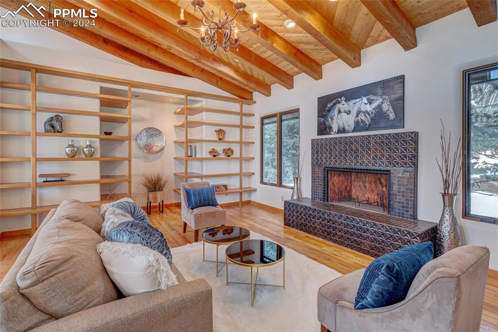 15 4th Street Colorado Springs, CO 80906 - Photo 9 of 46 a living room with furniture and a fireplace