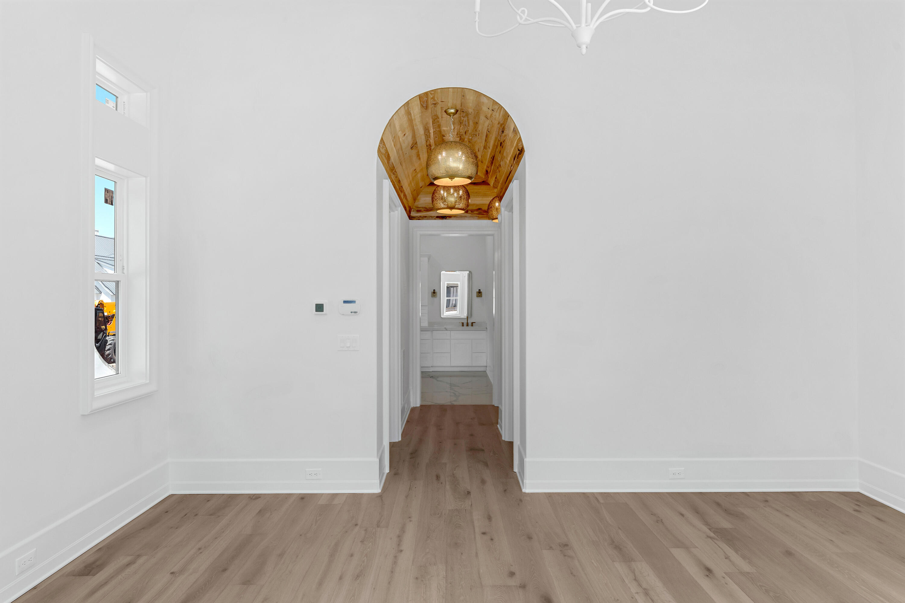 19 Quail Hollow Inlet Beach, FL 32461 - Photo 18 of 84 an empty room with wooden floor and mirror