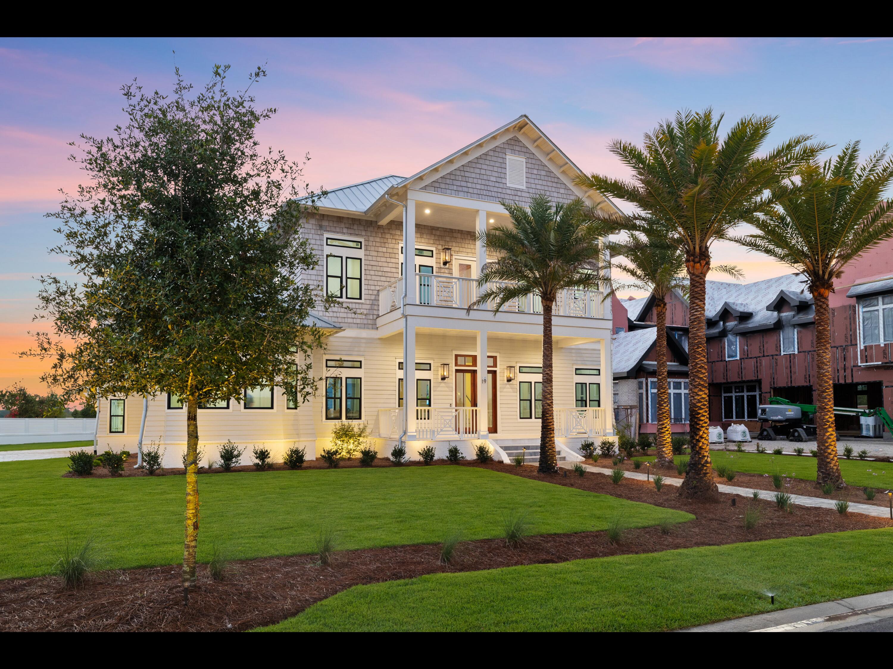 19 Quail Hollow Inlet Beach, FL 32461 - Photo 2 of 84 a front view of a house with a garden and trees