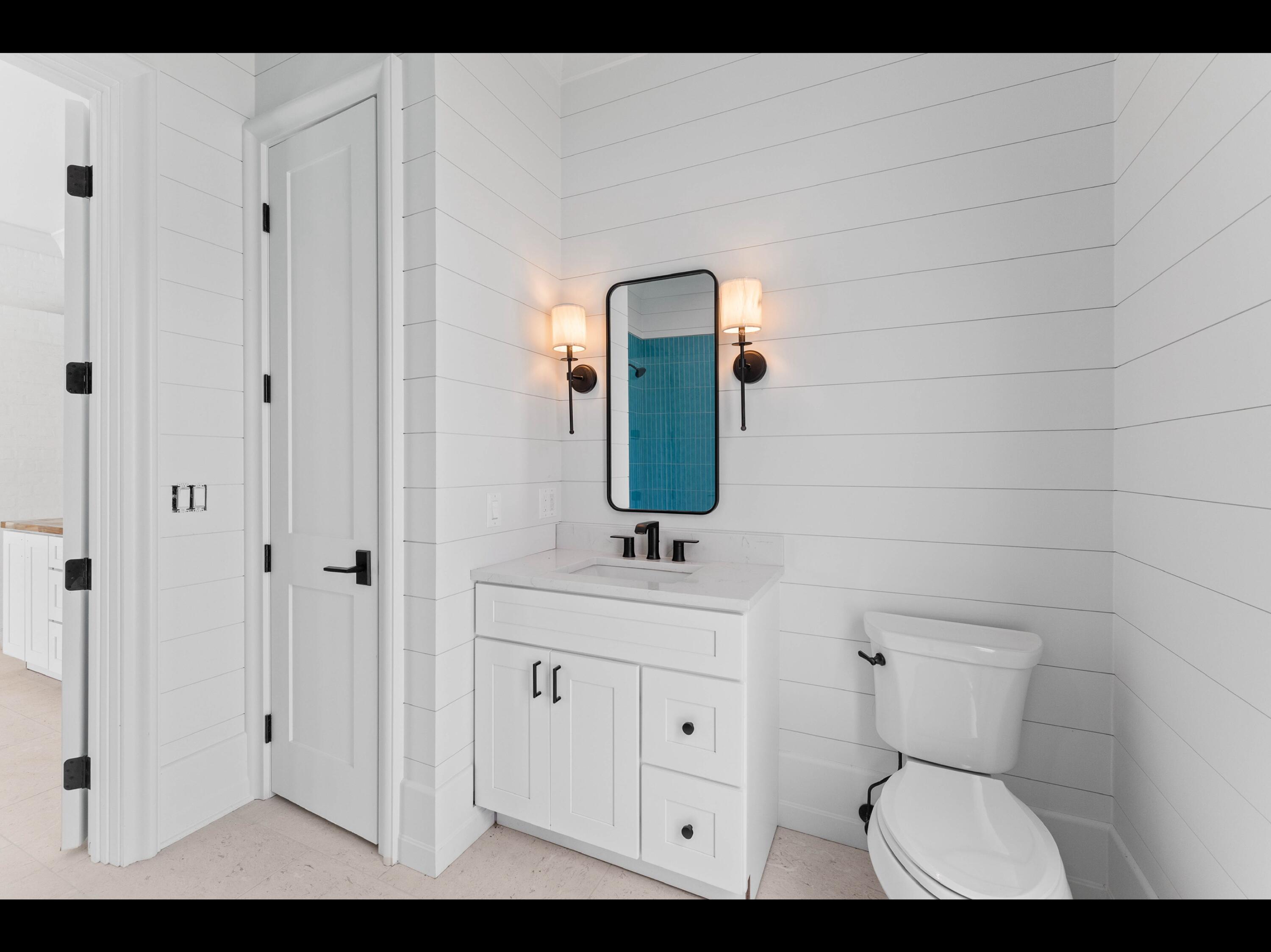 19 Quail Hollow Inlet Beach, FL 32461 - Photo 48 of 84 a bathroom with a toilet sink and mirror