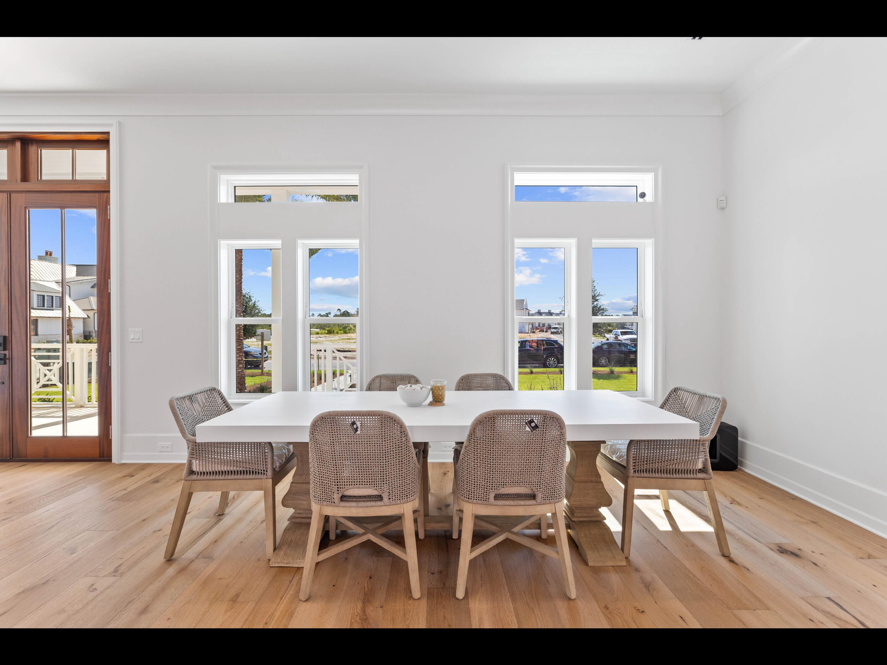 19 Quail Hollow Inlet Beach, FL 32461 - Photo 52 of 84 a view of a dining room with furniture and wooden floor