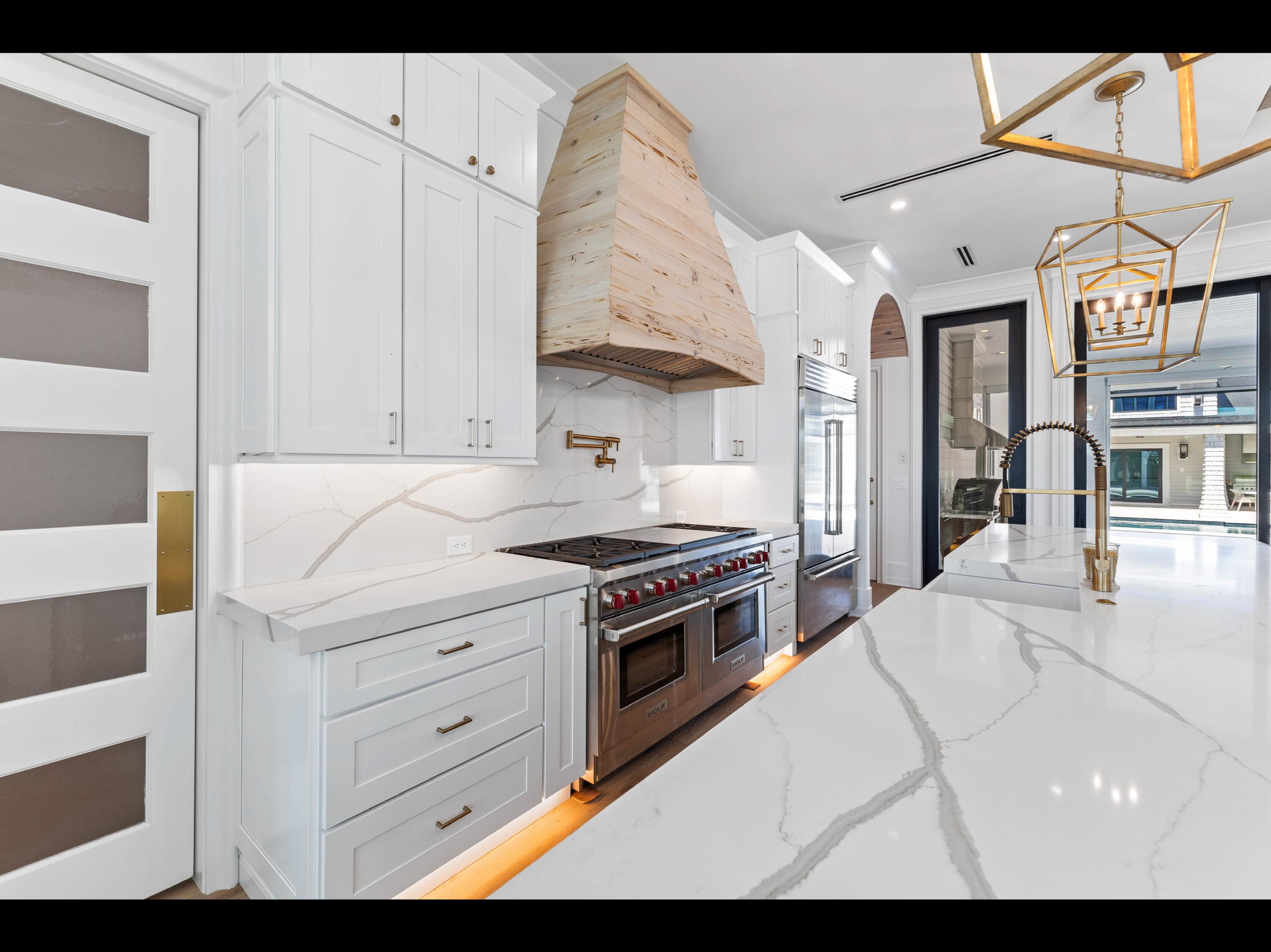 19 Quail Hollow Inlet Beach, FL 32461 - Photo 58 of 84 a kitchen with cabinets and appliances